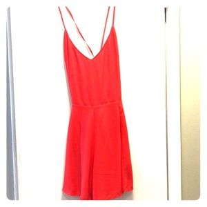 Strappy coral flowy romper